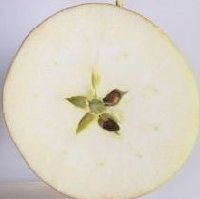 Fiesta apple cut in half