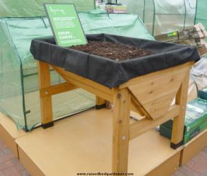 High level wooden raised bed